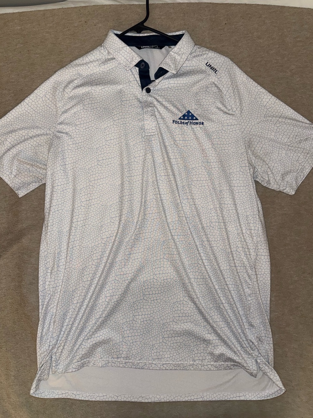 Unrl White Men's Folds of Honor Golf Polo with Subtle Pattern